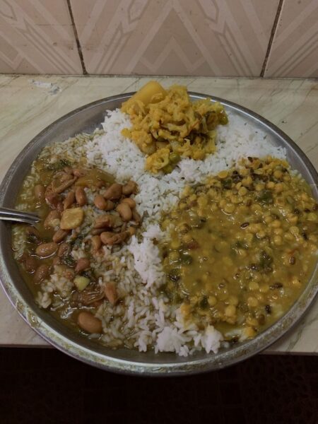 Himachali Dham a plate of home made food in Himachal Pradesh, India.